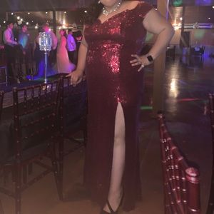 A maroon sparkle dress